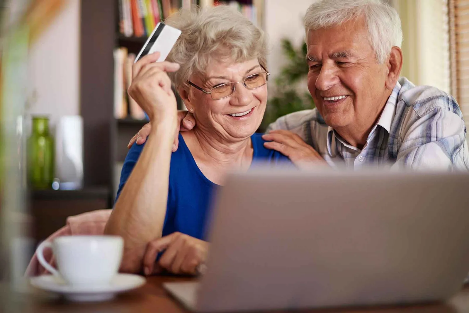 Person using assistive technology on a computer, representing digital web accessibility