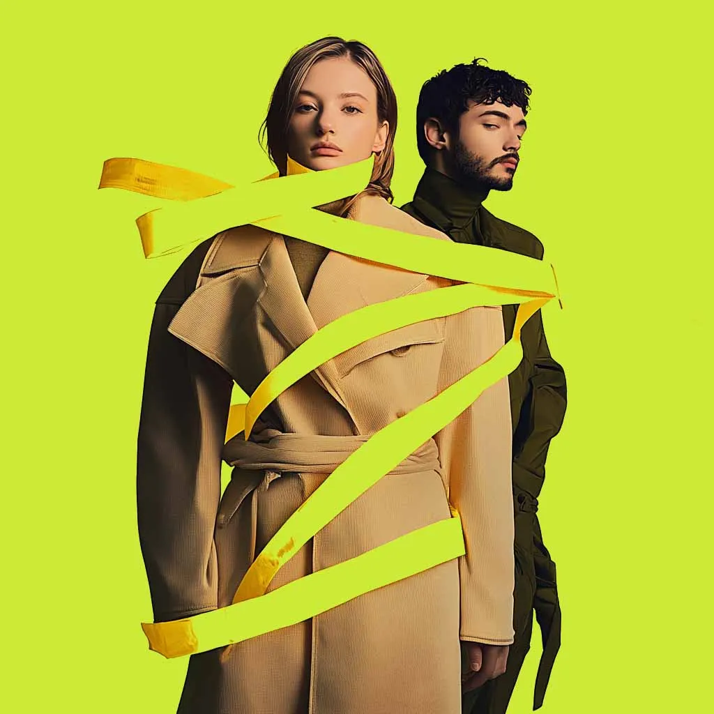 Two people wrapped in yellow tape against a bright green background